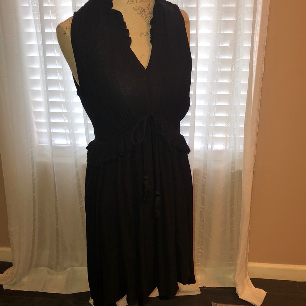 Tunic with tasseled tie at waist